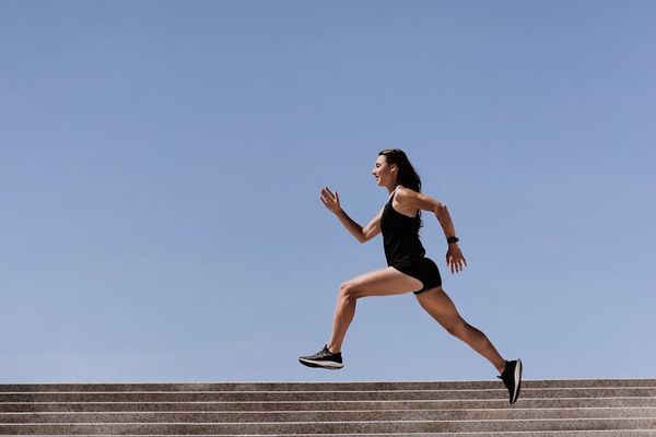 Person in dynamic motion during an exercise.